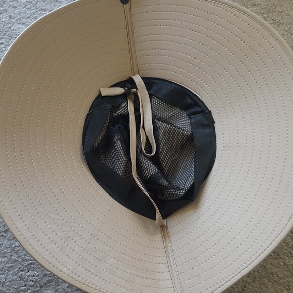 New, never-worn tan hiking hat with wide brim, drawstring for secure fit - Picture 3 of 4